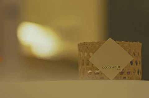 Selective focus on the paper with note and word "goodnight" Stock Photos