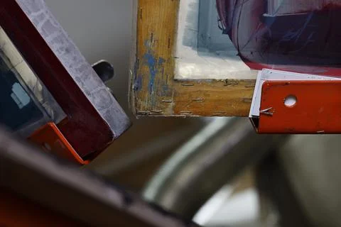 Selective focus photo of corners of frames for serigraphy production. Stock Photos