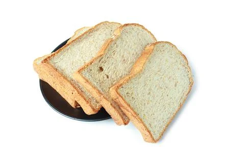 Selective focus of pile of toasted bread slices on a single black plate. On p Foto stock