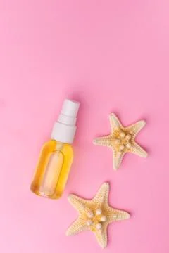 Selective focus, plastic spray jar with cosmetic oil Stock Photos