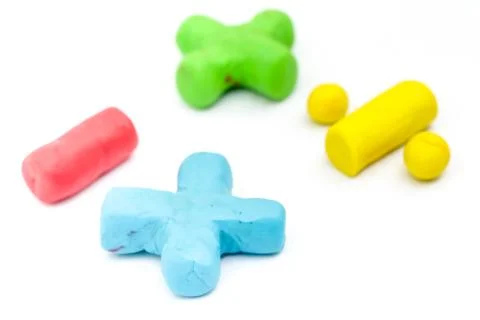 Selective focus on plus sign of Plasticine Math operator symbols Stock Photos