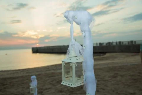 Selective focus point on Azerbaijan light lantern decoration sunrise at sea . Stock Photos