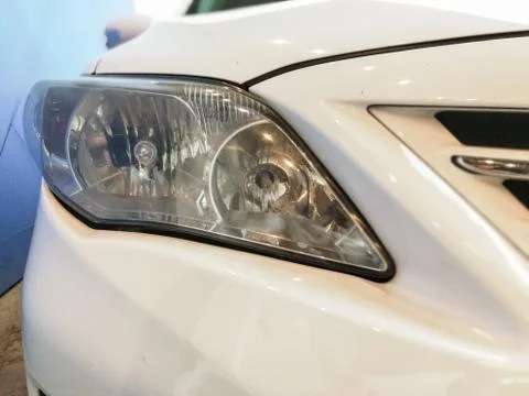 Selective focus point on Headlight lamp car Stock Photos
