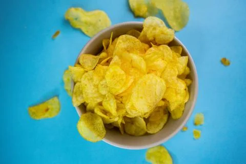 Selective focus, potato chips on a colored background Foto stock