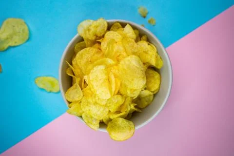 Selective focus, potato chips on a colored background Foto stock