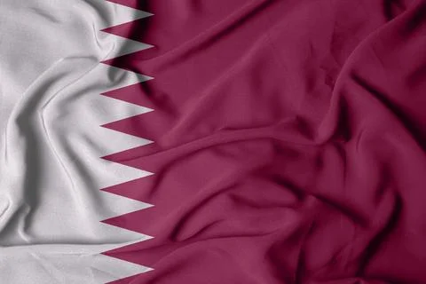 Selective focus of Qatar flag, with waving fabric texture in burgundy color. Stock Illustration
