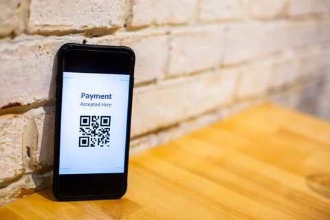 Selective focus to QR code payment on smart phone. Stock Photos