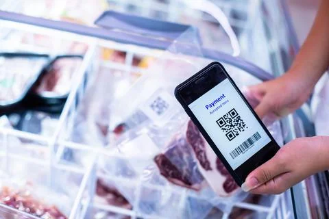 Selective focus to QR code tag on smartphone with blurry  frozen food at supe Stock Photos
