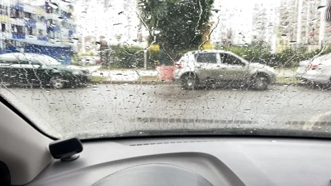 Selective focus to rain droplet on windshield. Stock Footage 244720419