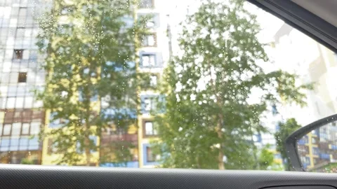 Selective focus to rain droplet on windshield. Stock Footage 244720683