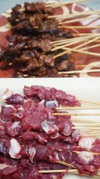 Selective Focus of Raw Beef Skewers with Grilled Satay Background Stock Photos