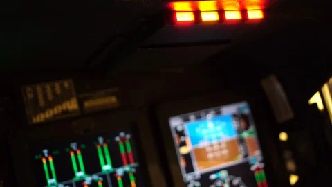 Selective focus of red and yellow master caution indicator light flashing Stock Footage 108537490