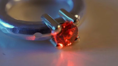 Selective focus of red ruby diamond ring Isolated on wooden background Stock Footage 124388026