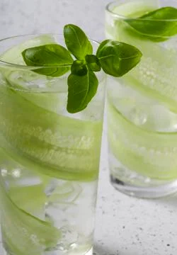 Selective focus, refreshing drink with cucumber Stock Photos