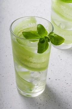 Selective focus, refreshing drink with cucumber Stock Photos