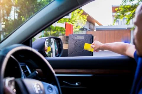 Selective focus to RFID reader with blur driver use key card to open the door Stock Photos