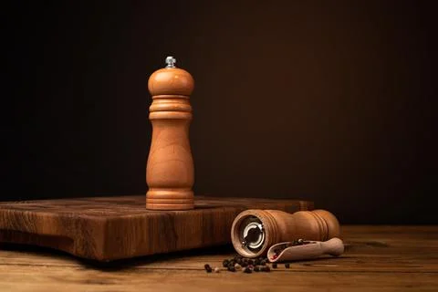 Selective focus of salt and pepper grinders Stock Photos