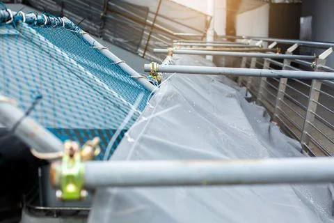 Selective focus to scaffolding pipe clamp and parts, An important part of bui Фото
