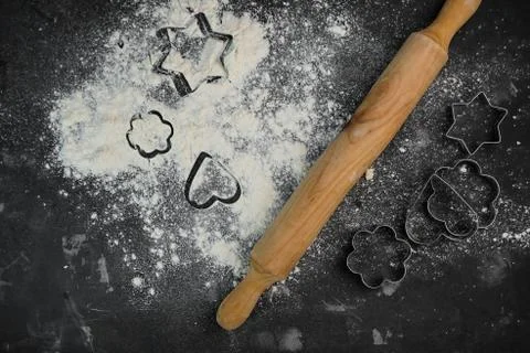 Selective focus, scattered wheat flour on a dark background Stock Photos