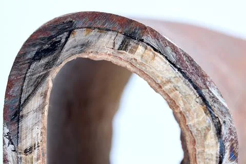 Selective focus Section of industrial hot water boiler pipe with limescale de Stock Photos