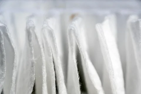 Selective focus on section of a new white and clean residential air filter Stock Photos