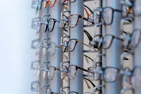 Selective focus shot of designer spectacles or glasses frames on display in an o Stock Photos