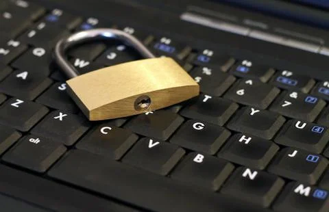 Selective focus shot of a lock on a computer keyboard Stock Photos