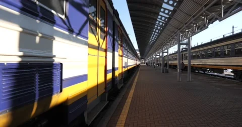 Selective focus at sidewalk of platform in railway station Video stock 222962945