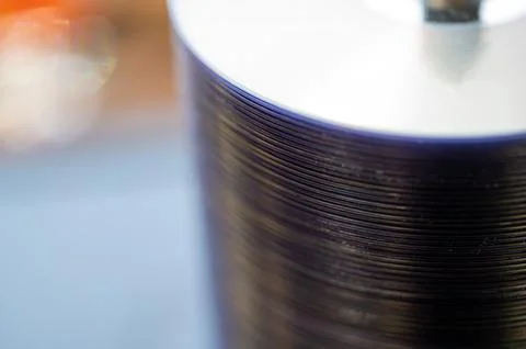 Selective focus on a sleeve of compact discs CD's used for storing electronic Foto stock