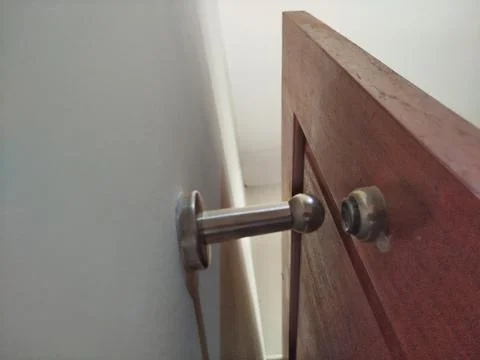 Selective focus a slightly dirty door stopper 스톡 사진