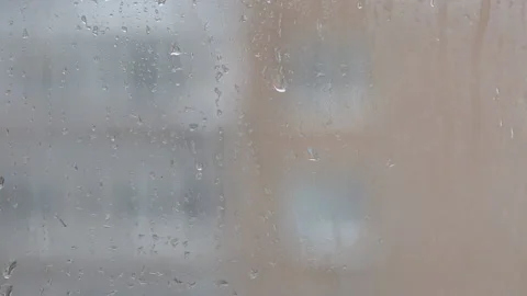 Selective focus. Snow and sleet falling on a window. Stock Footage 169885361