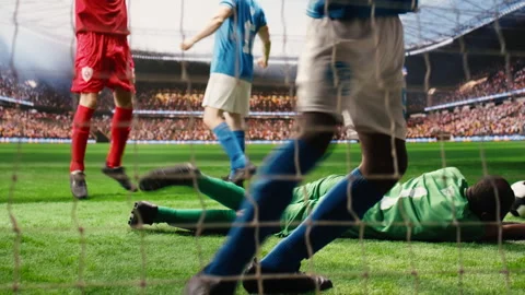 Selective focus of soccer ball hitting net and crossing goal post line Stock Footage 337999090