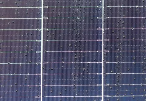 Selective focus, solar panels with drop of water after rain. Stock Photos