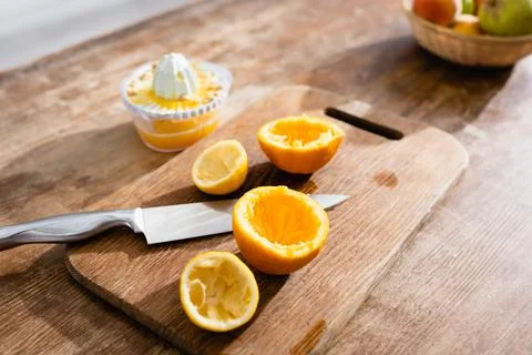 Selective focus squeezed orange halves Stock Photos