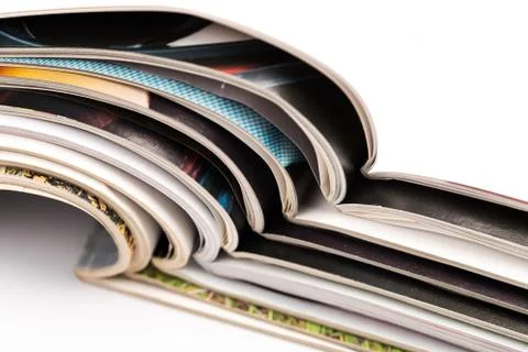 Selective focus of the stacking magazine place on white background Stock Photos