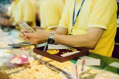 Selective focus to staff are counting banknote. 스톡 사진
