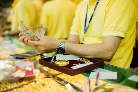 Selective focus to staff are counting banknote. Stock Photos