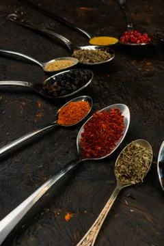 Selective focus, tablespoons and teaspoons with spices Stock Photos