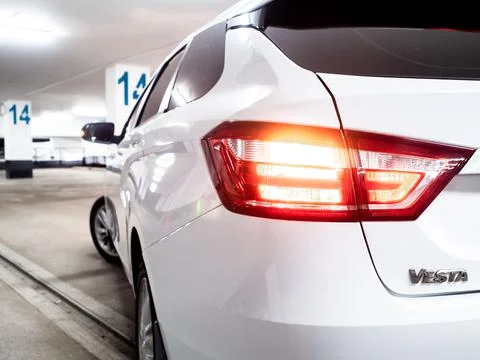 Selective focus on the tail lamp of a Lada Vesta SW car. Stock Photos