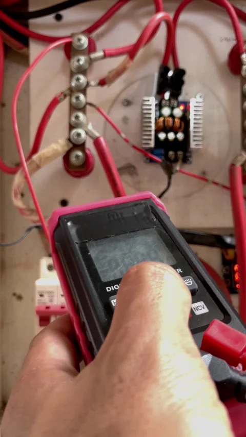 Selective Focus Of A Technician's Hand Turning On The Digital Multitester Stock-Footage 345864964