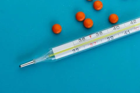 Selective focus, temperature thermometer with tablets Stock Photos