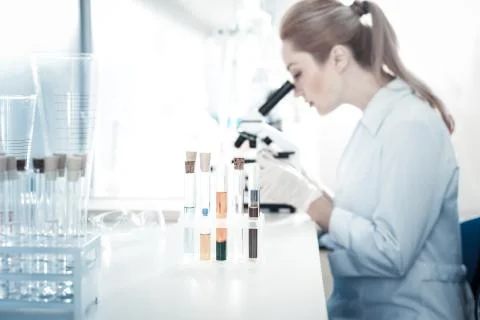 Selective focus of test tubes standing on the table Stock Photos