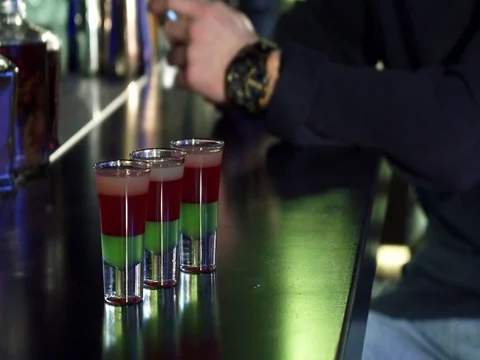 Selective focus on three shots on the bar table man using his smart phone on the Video stock 84689929