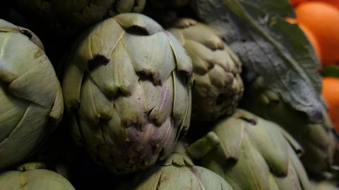 Selective focus tilt up shot of fresh fruits and vegetables stall Stock Footage 124305228
