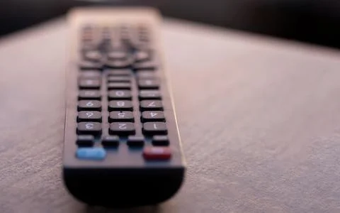 Selective focus on TV remote control buttons 写真素材