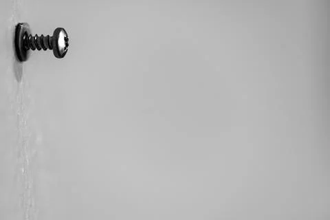 Selective focus on a typical drywall anchor installation . Foto stock