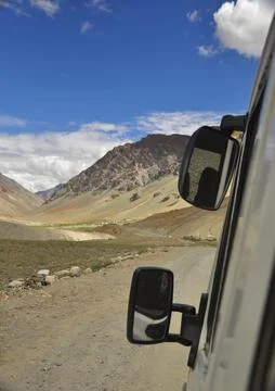 Selective focus of view of beautiful valley from passenger van Stock Photos