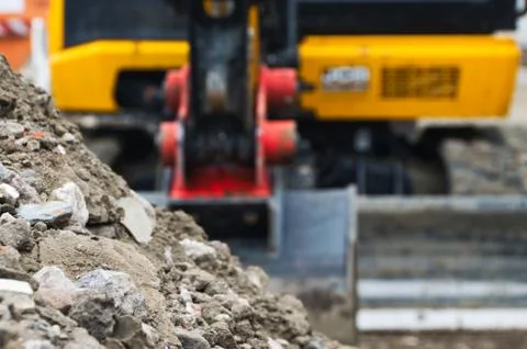 Selective focus view of an excavator on a construction site Stock Photos