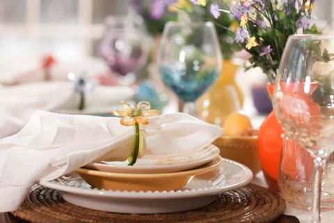 Selective focus view of spring or easter dining place settings Stock Photos