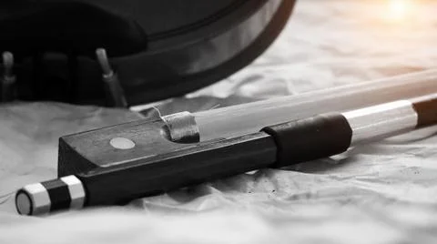 In selective focus of violin bow frog and violin bow screw,the end part of a  Stock Photos